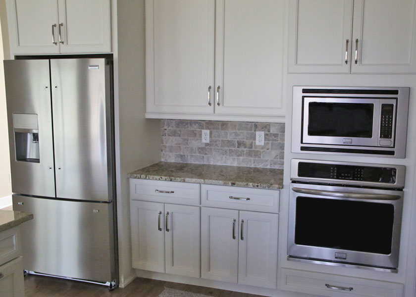 custom home builder and custom kitchen with appliances