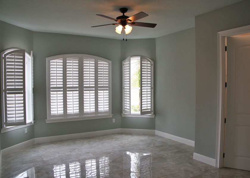 custom master bedroom with tile and lighting in wedgefield fl